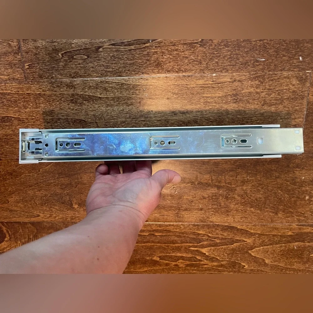 Mountable slide-out tie holder